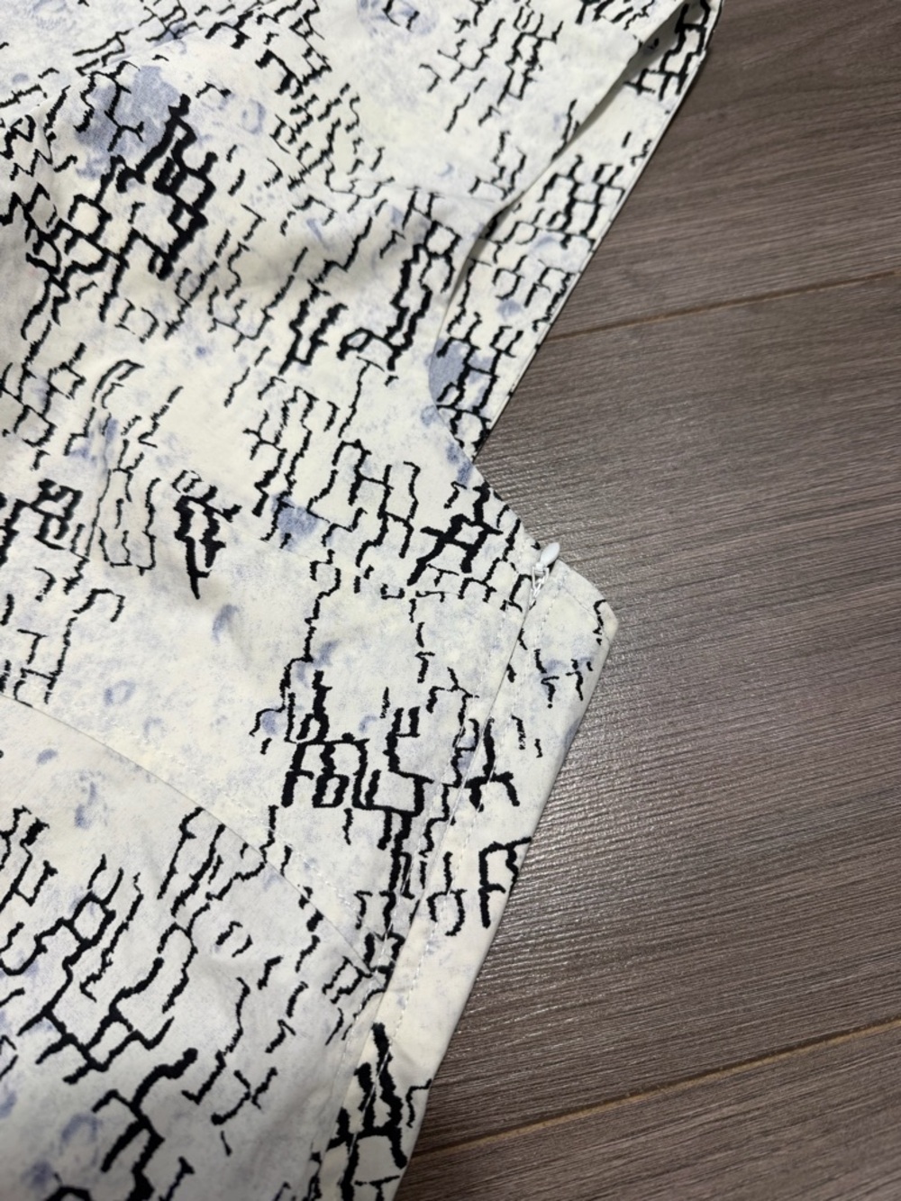 COS sleeveless top with a blue and black abstract geometric pattern - Picture 10 of 14